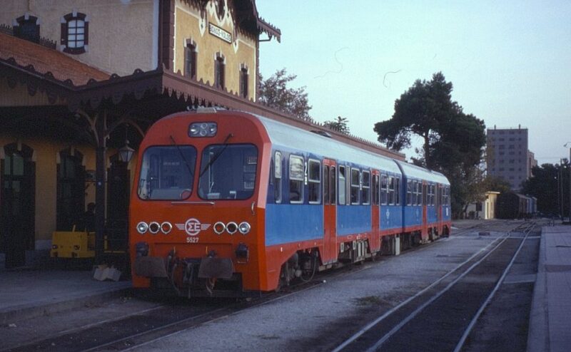 Passenger train operating in Evros region Greece railway line rural landscape
