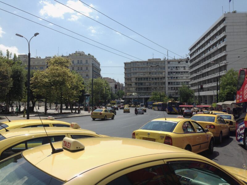 Taxi drivers strike protest in Athens with yellow taxis and demonstrators