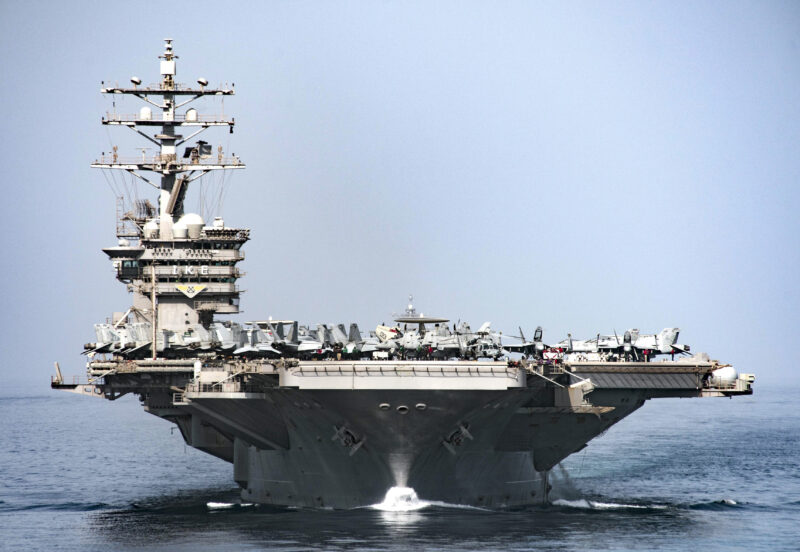 US Navy ships escorting oil tankers in Strait of Hormuz realistic scene