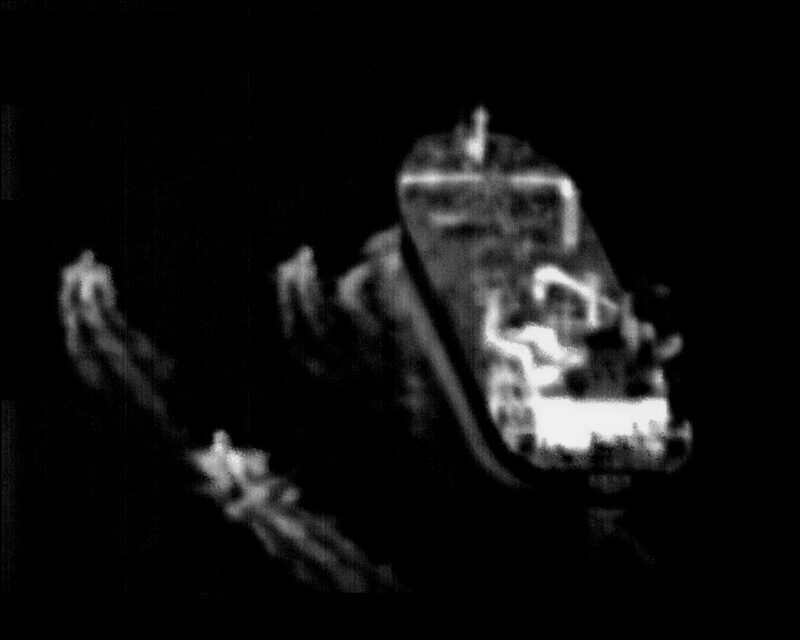 Oil tanker in Strait of Hormuz with military boats amid rising tensions