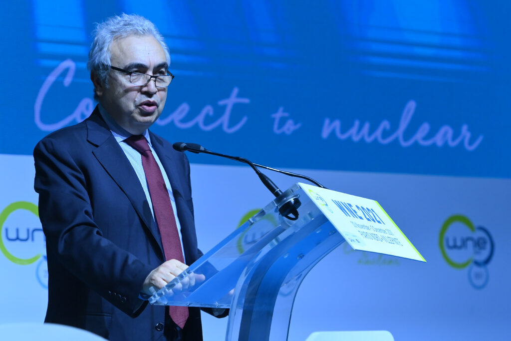 Oil tanker in Strait of Hormuz with military presence during Middle East crisis