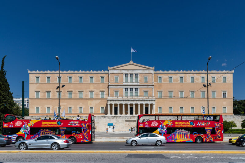 Gas station in Athens with high fuel prices and people refueling cars during energy crisis