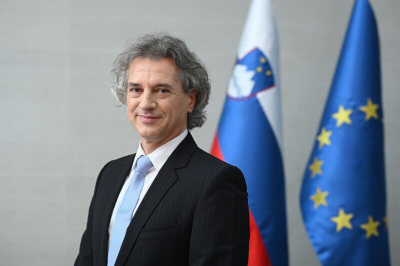 Voters लाइन up outside polling station Slovenia parliamentary elections