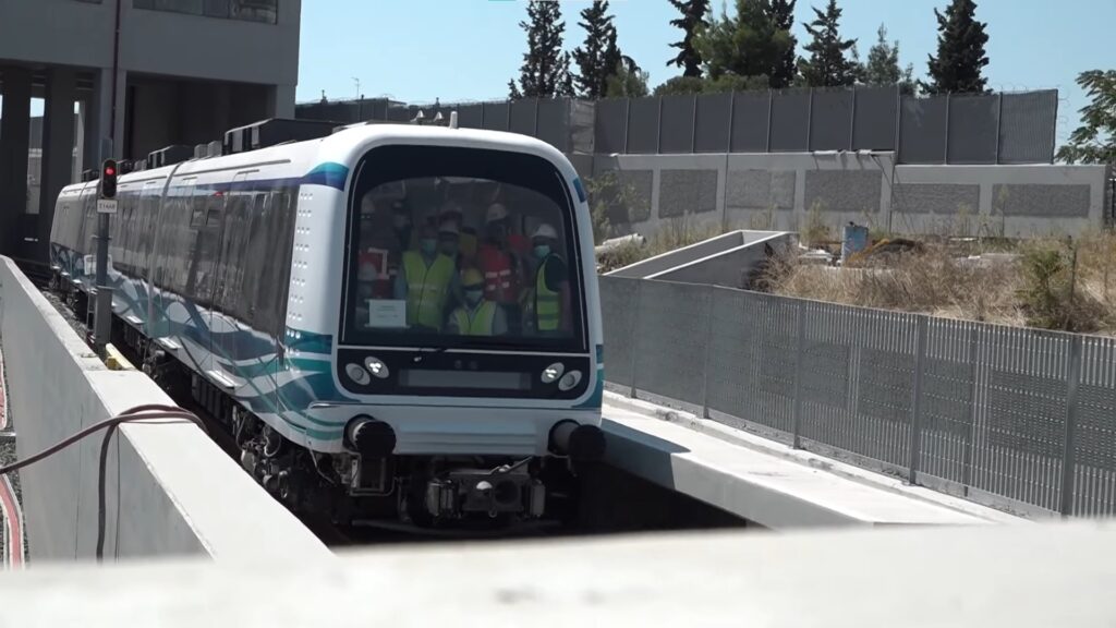 Thessaloniki metro station with passengers and arriving train Greece